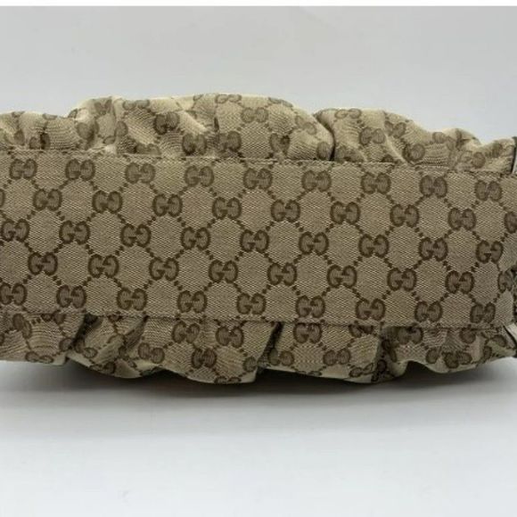 Authenticated GUCCI BROWN MONMOGRAMMED CANVAS BUCKET TOTE - Picture 2 of 4